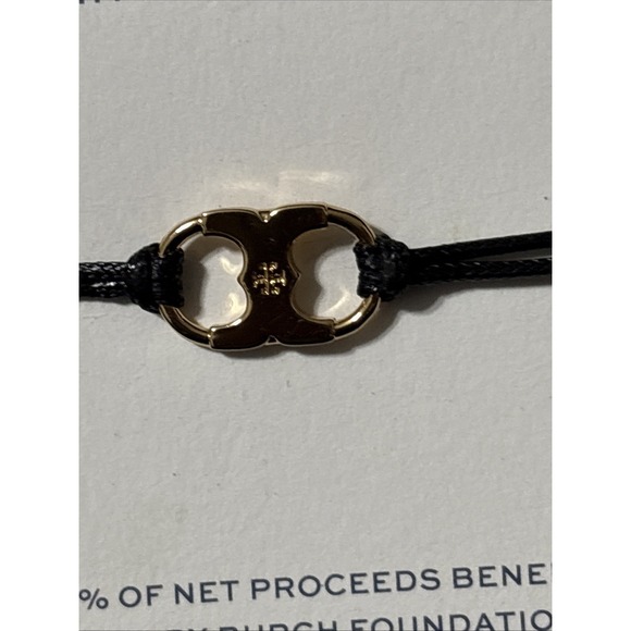 Tory Burch Foundation Embrace Ambition Bracelet Black
with Gold Tone Logo Accent - Picture 2 of 4